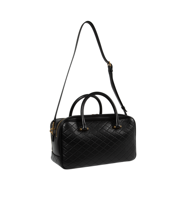 Image 2 of 3 - BLACK - SAINT LAURENT Lyia Duffle Bag featuring quilted lambskin, two top handles, detachable shoulder strap, cotton lining and zip closure. 12.2 X 6.3 X 5.1 inches. 90% lambskin, 10% metal. Made in Italy.  
