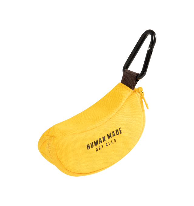 Image 2 of 3 - YELLOW - Human Made Banana Pouch is crafted from thick cotton canvas and features a playful banana-shaped silhouette with a mini carabiner for easy attachment. Designed with a rubber-printed brand logo, a fruit sticker-style heart logo, and a double-zip closure that opens to reveal a banana peel-inspired interior. Main Material: 100% Cotton. Dimensions: 10 cm W x 4.5 cm H x 5 cm D. Fits: AirPods, keys, coins, lip balm, charging cables, and other small essentials.
