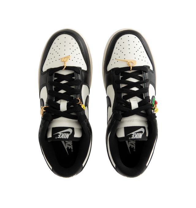 Image 5 of 5 - BLACK - NIKE Dunk Low SE Sneaker featuring charm details, plush padding, leather upper, foam midsole and rubber outsole with classic pivot circle.
