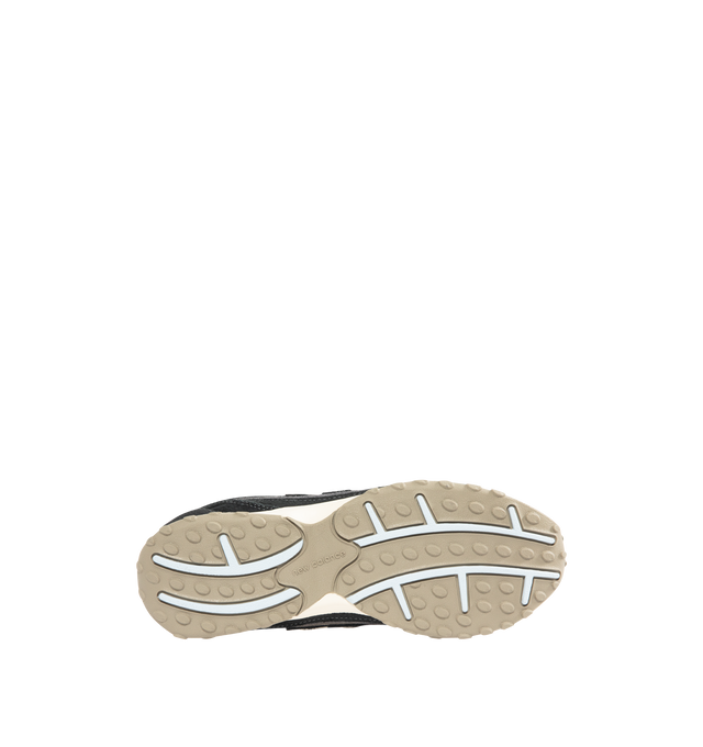 Image 4 of 5 - BLACK - NEW BALANCE 204L Sneaker featuring multi-piece upper with embossed overlay, screen-printed graphics along the saddle, distinctive outsole with 2000s-inspired strike path and 70s-influenced tread pattern, double-stacked suede 'N' logo and lace up closure. Premium suede upper. EVA outsole.