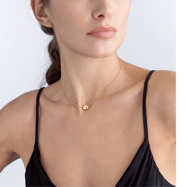 Image 4 of 4 - GOLD - PAMELA ZAMORE Holos Baby Hug Necklace featuring two sculptural halves of a piece interlocking to become one, 18K yellow gold, 4.8g. Hirshleifers offers a range of pieces from this collection in-store. For personal consultation and detailed information about jewelry, please contact our dedicated stylist team at personalshopping@hirshleifers.com. This item may be restricted for online purchase to international clients. For assistance purchasing this item please contact our dedicated styl