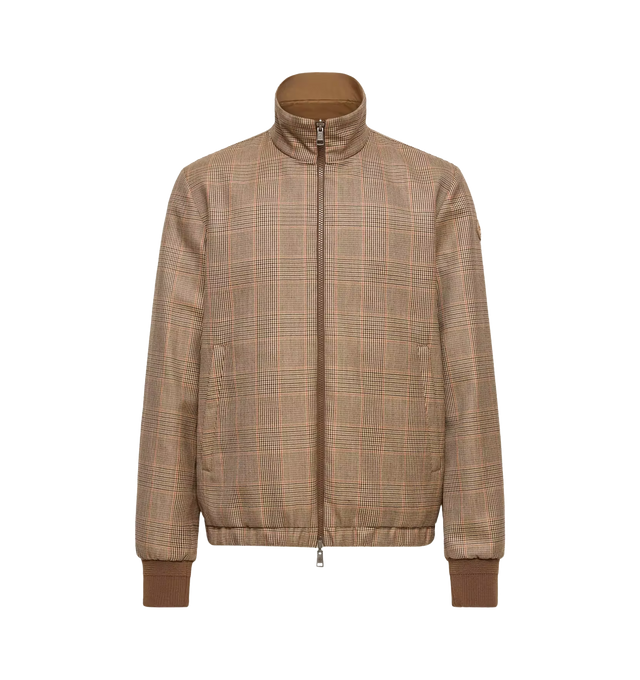 Image 1 of 1 - NEUTRAL - Moncler Mens Frothive Reversible Jacket is crafted from virgin wool with a reversible Aquaflect Light side. Features a reversible design, high neck, zip-front closure, zipped pockets, ribbed cuffs, and leather logo patch. Exterior: 100% Virgin Wool; Rib Cuffs: 89% Virgin Wool, 10% Polyamide/Nylon, 1% Elastane/Spandex; Lining: 100% Polyester; Leather Tag: Cow Leather. Made in Romania.