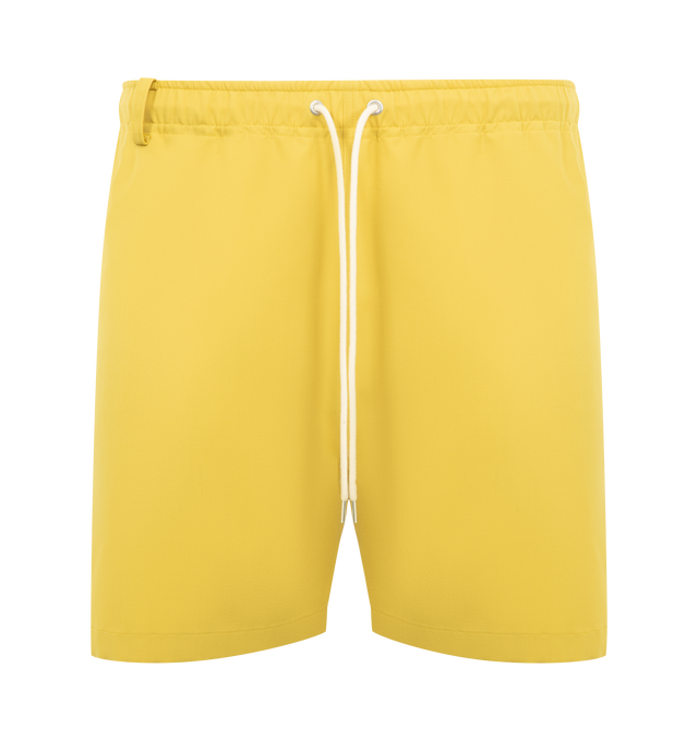 Image 1 of 3 - YELLOW - AURALEE Wool Max Canvas Shorts featuring wide fit, short length, belt loops and elasticated drawstring waistband. 100% wool.