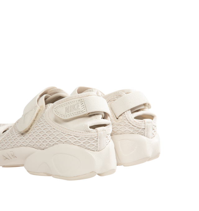Image 3 of 5 - WHITE - NIKE Air Rift Shoe featuring mixed textile upper, hook-and-loop straps, Nike Air unit in the heel, foam midsole and rubber detailing on the outsole with rugged tread.