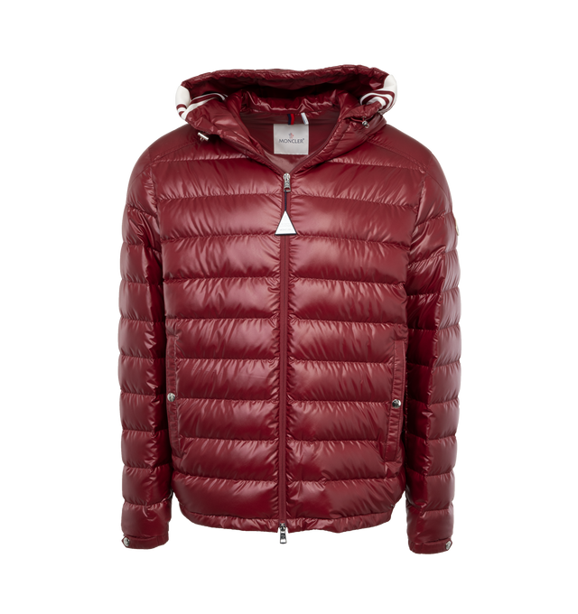 Image 1 of 4 - RED - MONCLER Cornour Padded Jacket featuring two-way zip fastening, adjustable hood, padded insulation, and rubberised logo and striped detailing across the hood. 100% polyester. Padding: 90% down, 10% feather. Made in Moldova. 