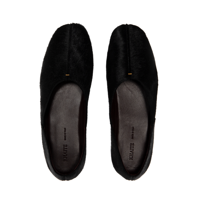 Image 4 of 4 - BLACK - KHAITE Jane Flat featuring a slipper-like flat, padded insole for cloud-like comfort and signature gold staple detail at rounded vamp. Made in Italy.