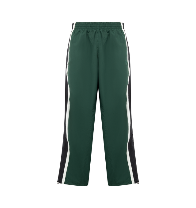 Image 1 of 3 - GREEN - VETEMENTS Tracksuit Pants featuring elasticized waistband, three-pocket styling and stripes at outseams. 100% polyester. Made in Italy.
