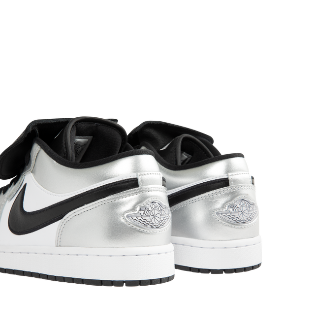 Image 3 of 5 - SILVER - NIKE Air Jordan 1 Low SE Sneaker featuring premium materials, metallic finishes, encapsulated Air-Sole unit, genuine and synthetic leather in the upper and solid rubber outsole.