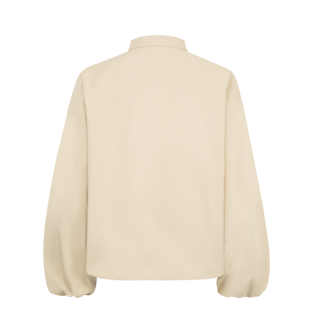 Image 2 of 3 - NEUTRAL - MONCLER Gruissan Padded Jacket featuring a cotton and nylon blend, cotton lining, padded, collar with snap button closure, zipper closure, welt pockets, elastic cuffs and hem and leather logo patch. 64% cotton, 36% polyamide/nylon. Padding: 100% polyester. Made in Romania.