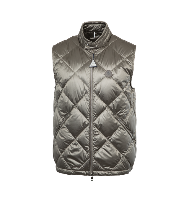 Image 1 of 3 - SILVER - MONCLER Nasta Down Vest featuring yarn-dyed nylon lger lining, down-filled, collar with snap button closure, zipper closure, zipped pockets, inner pocket with snap button closure and leather logo patch. 100% polyamide/nylon. Padding: 90% down, 10% feather. 