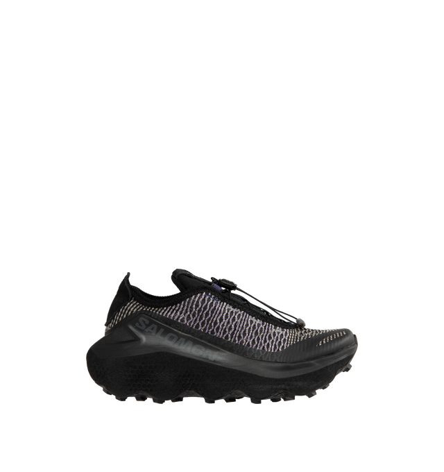 Image 1 of 5 - BLACK - Salomon Orava Advanced Unisex Sportstyle Shoes, drawing inspiration from the free curves of the Arve river, an elevated expression of the movement of nature. Featuring All-Terrain Contagrip rubber outsole with a distinctive, wavy geometry designed to diffuse pressure and to break down repeated underfoot impact for enhanced, durable comfort. OptiFOAM+ midsole, Quicklace lacing system and Matryx textile upper designed to resist abrasion with individually-coated high-tenacity Kevlar and