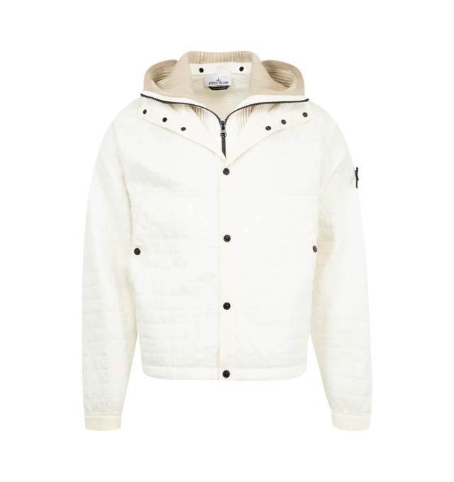 Image 1 of 4 - WHITE - STONE ISLAND Bomber Jacket featuring padded hooded jacket in a light nylon rep with an ultra-tight weaving construction, removable ribbed knit insert with hood and zipper fastening on tape that attaches to garment with snaps, hood with snap-fastened tape drawstring, raglan sleeves, hand pockets with diagonal tape trim and snap, flat inlay at sides and under arms, Stone Island badge on left sleeve, elasticated tape at cuffs and snap fastening on nylon tape. 100% polyamide/nylon.