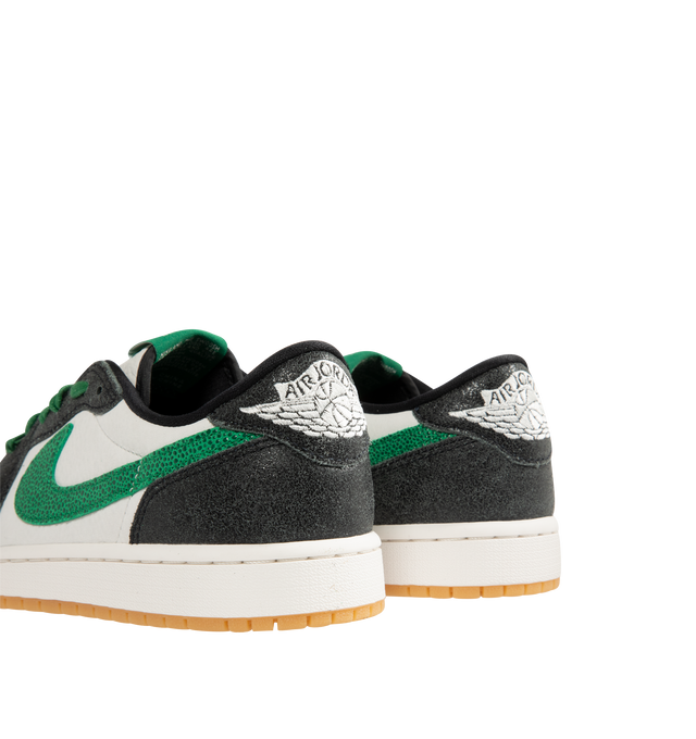 Image 3 of 5 - GREEN - Men's Air Jordan 1 Retro Low OG "Phantom and Pine Green" Sneakers feature a genuine leather upper with the iconic low-top silhouette for a timeless heritage look. These lifestyle sneakers combine encapsulated Air-Sole cushioning with a durable rubber outsole for lightweight comfort, lasting support, and reliable traction. Main Material: Genuine Leather. Midsole: Encapsulated Air-Sole Unit. Sole: Rubber.