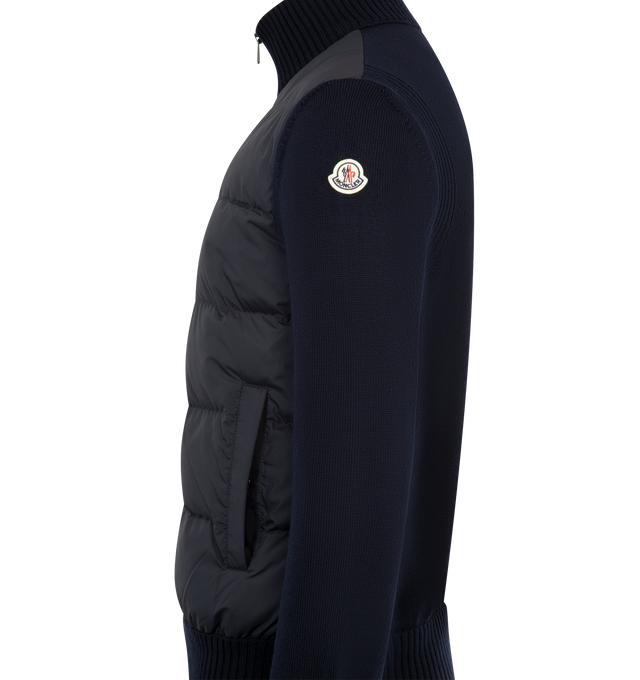Image 3 of 3 - BLUE - MONCLER Padded Wool Zip-Up Cardigan featuring down-filled and padded polyester front, gauge 7, zipper closure, pockets with snap button closure and logo patch. 100% polyester. 100% virgin wool. Padding: 90% down, 10% feather. Made in Moldova.
