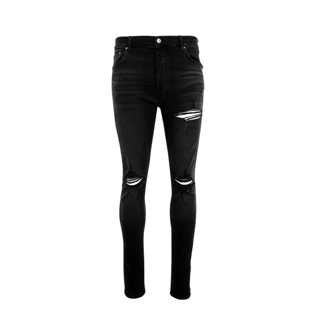 Image 1 of 3 - BLACK - Amiri MX1 Skinny Jeans are a 5-pocket style with a button and zip fly, distressing and rips overall, and a fitted silhouette with skinny legs. Polyester and elastane.