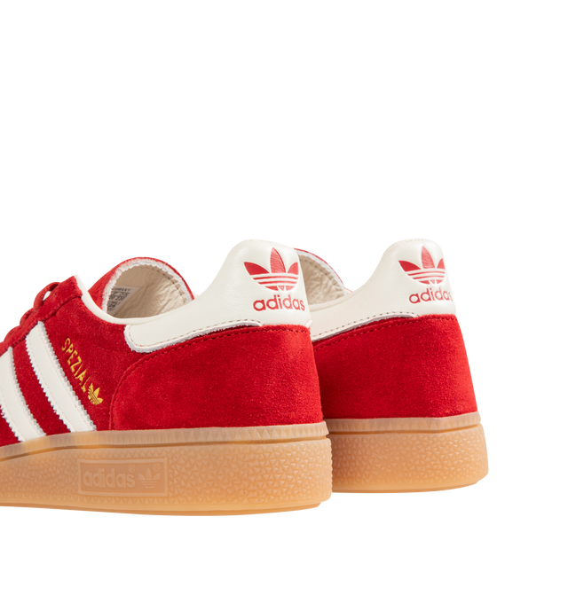 Image 3 of 5 - RED - ADIDAS Handball Spezial Sneakers featuring premium suede upper, serrated 3-Stripes and heel tab, regular fit, lace closure, leather lining and rubber outsole.
