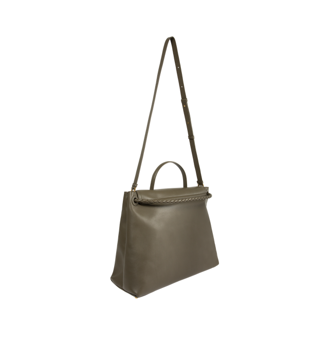Image 2 of 4 - GREEN - BOTTEGA VENETA Large Ciao Ciao Bag featuring top handle, silky calf leather with two-way flap and signature knot detail, a hidden hook closure, allowing the flap to be closed in the front or attached to the interior Intrecciato pocket, sliding shoulder carry strap, adjustable and detachable cross-body strap and compartmented interior with one zipped pocket. Calfskin. Lining: bonded suede. 32cm x 41.5cm x 14.5cm. Made in Italy.