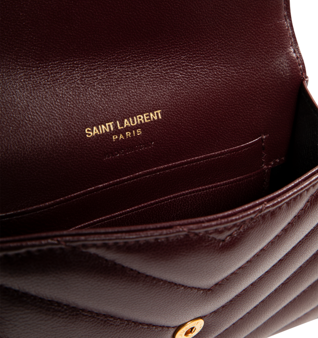 Image 3 of 3 - RED - SAINT LAURENT Small Envelope Wallet featuring quilted overstitching, leather lining, snap button closure, one flat pocket at back, four card slots and one open compartment. 5.3" X 3.7" X 1.2". 100% lambskin.