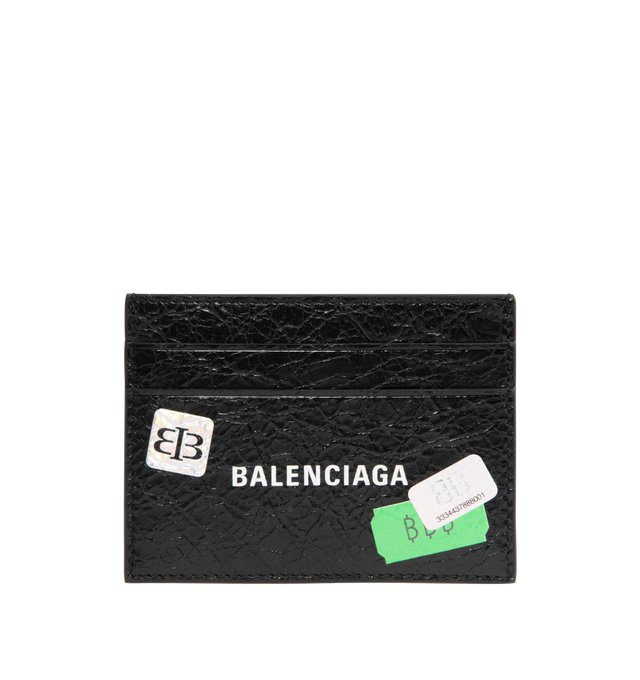 Image 1 of 3 - BLACK - BALENCIAGA Cash Card Holder in arena lambskin with printed stickers featuring Balenciaga logo printed at front, 4 card slots and 1 bill pocket. L3.9 x H2.9 x W0.4 inch. Lambskin. Made in Italy.