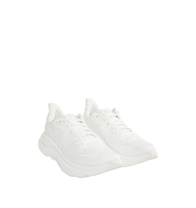 Image 2 of 5 - WHITE - HOKA Clifton 10 Sneaker featuring jacquard knit, reflective upper details, smooth MetaRocker, rearfoot-focused Active Foot Frame, CMEVA midsole, molded EVA sockliner and inherently durable abrasion rubber.