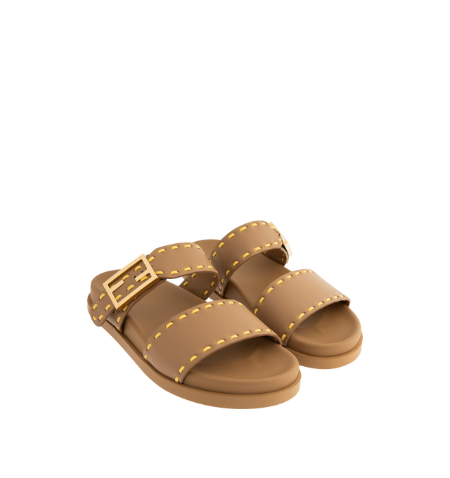 Image 2 of 4 - BROWN - FENDI Feel Slide Sandal featuring double-band flat slides with FF Baguette decorative buckle, hand-sewn contrasting macro Selleria topstitches and gold-finish metalware. 100% calfskin. Made in Italy.