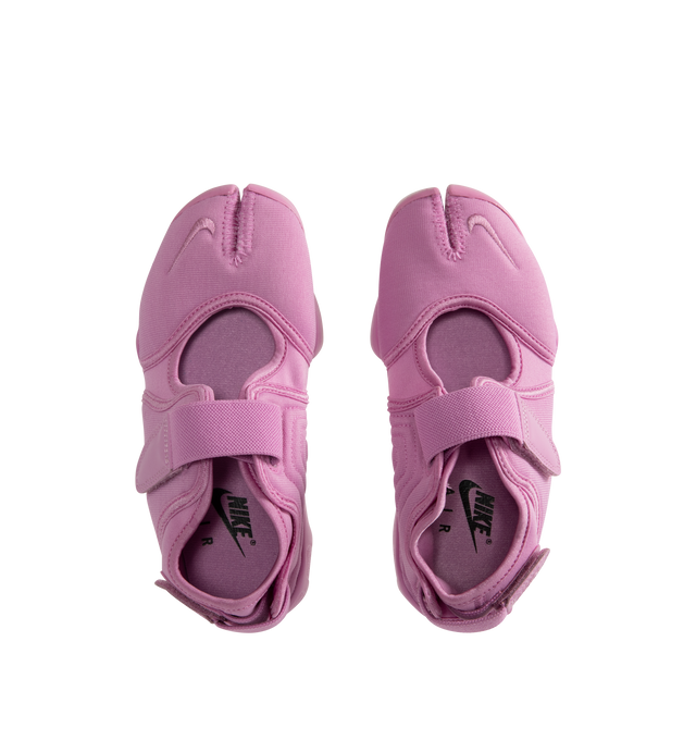 Image 5 of 5 - PINK - NIKE Air Rift Sneaker featuring hook-and-loop straps on the midfoot and heel, Nike Air unit in the heel combined with plush foam, rubber detailing on the outsole, upper features a blend of elastane, polyester and nylon materials for a flexible fit and split toe design.