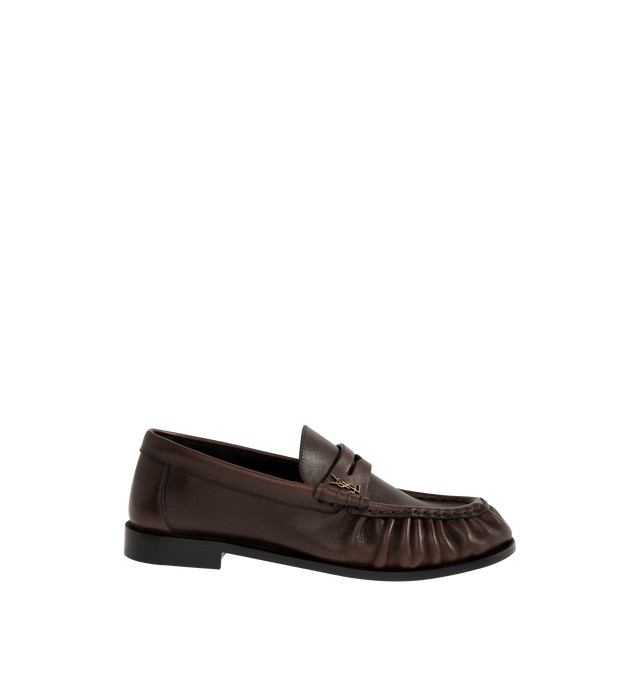 Image 1 of 4 - BROWN - SAINT LAURENT Le Loafer featuring supple penny loafers decorated with the cassandre, hand-stitched moc toe, metal-free tanned leather and leather sole. Calfskin. Made in Italy.
