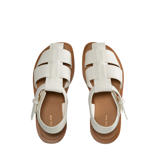 Image 4 of 4 - WHITE - THE ROW Fisherman Sandal featuring seamless strap construction and covered adjustable buckle closure. 100% Leather. Rubber sole. Made in Italy. 