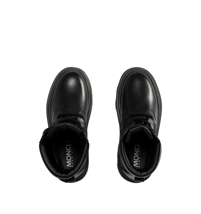 Image 5 of 5 - BLACK - Moncler Womens Aurea Ankle Boots are crafted from leather with polyamide and nylon accents and feature a round toe, lace-up closure, leather lining, and a durable elastodiene sole. These designer ankle boots combine a classic lace-up silhouette with performance-inspired detailing for versatile everyday wear. Main Material: Leather, Polyamide, Nylon; Lining: Leather; Sole: Elastodiene. Made in Italy.