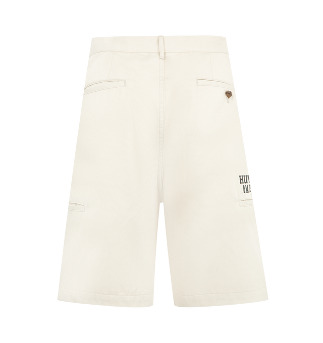 Image 2 of 3 - WHITE - HUMAN MADE Skater Shorts featuring relaxed fit, lightweight polyester-cotton twill, two tucks on the front, zip fly with branded button, total of six pockets, brand logo above the right side pocket, heart button on the right back pocket and heart patch on the front left hem. 65% polyester, 35% cotton. Made in Japan..
