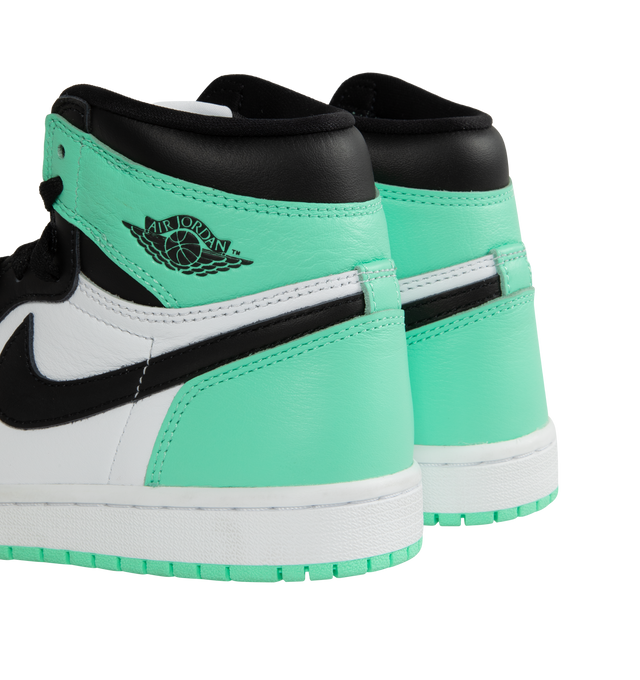 Image 3 of 5 - GREEN - Air Jordan 1 Retro High OG "Green Glow" classic sneaker crafted from premium materials in a fresh mint green color. Leather upper offers durability and structure.Encapsulated Air-Sole units provide lightweight cushioning. Solid rubber outsoles give you traction on a variety of surfaces. Signature Wings logo stamped on collarStitched-down Swoosh logo.