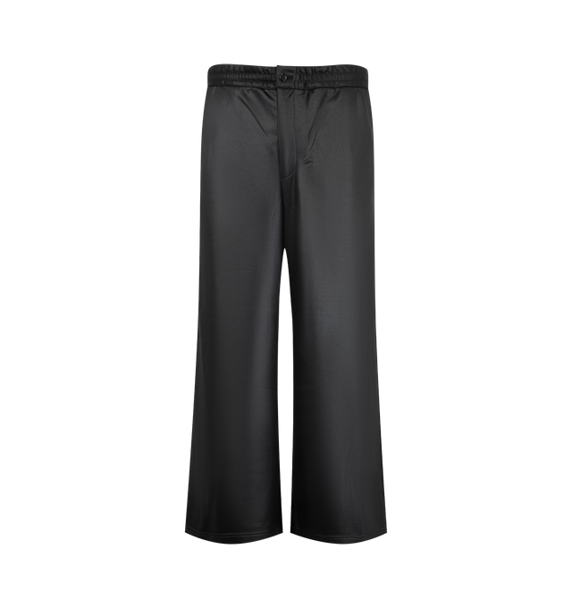 Image 1 of 3 - BLACK - Homme Plus sleek black wide-leg trousers feature a smooth satin finish and an elasticated waistband with a button closure.