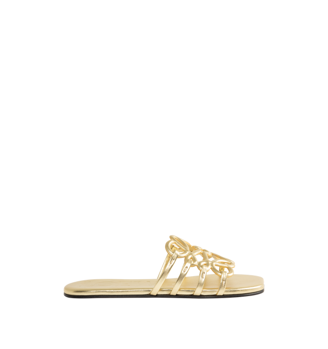 Image 1 of 4 - GOLD - LOEWE PAULA'S IBIZA Petal Anagram slide in laminated lambskin featuring a cut-out Anagram upper with hand-painted edges and hand-stitched seams, 5mm heel, embossed LOEWE on the insole, padded leather insole, rubber-injected island on the outsole and hand-stitched seams. Laminated lambskin. Made in Italy.