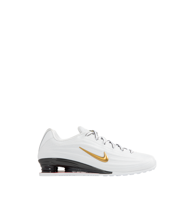 Image 1 of 5 - WHITE - NIKE Shox Z Sneaker featuring a slim, low-profile shape, textile upper, synthetic leather accents, Nike Shox columns, circular Waffle outsole, foam midsole and rubber outsole.