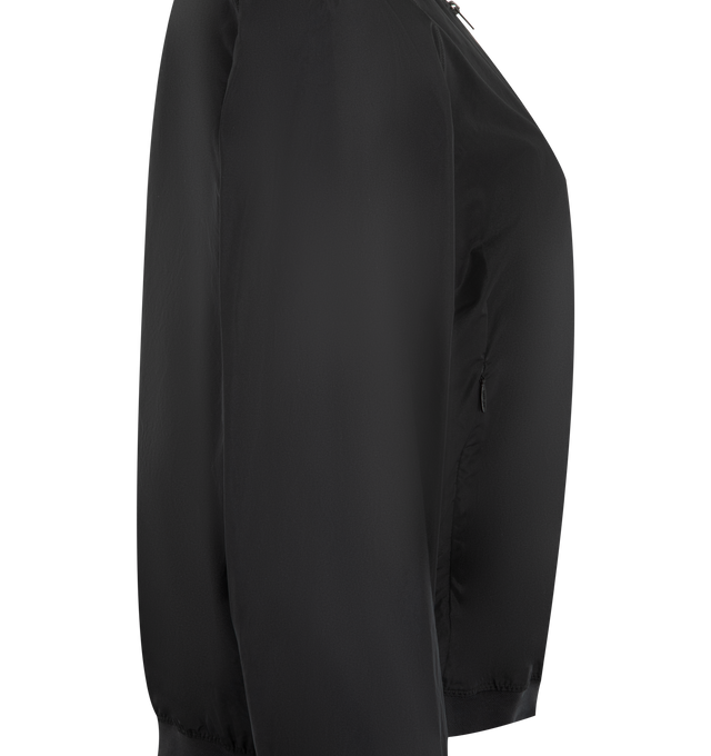 Image 3 of 3 - BLACK - THE ROW Odeon Jacket featuring lightweight bomber jacket in technical fabric with structured stand collar, concealed zip pockets, front zip closure, and ribbed cuffs and hem. 100% polyester. Made in Italy.