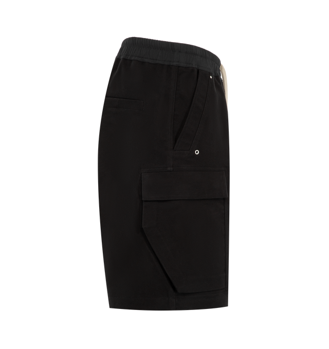 Image 3 of 3 - BLACK - Rick Owens Mens Cargobela Shorts are crafted from overdyed waxed cotton denim. Feature a knee-length wide-leg silhouette, dropped crotch, elasticized waistband with drawstring, exposed Bela front zip closure with dual snap buttons, concealed snap cargo pockets, rear welt pockets, and topstitch detailing. Main Material: 100% Cotton; Waistband: 97% Cotton, 3% Elastane. Made in Italy.