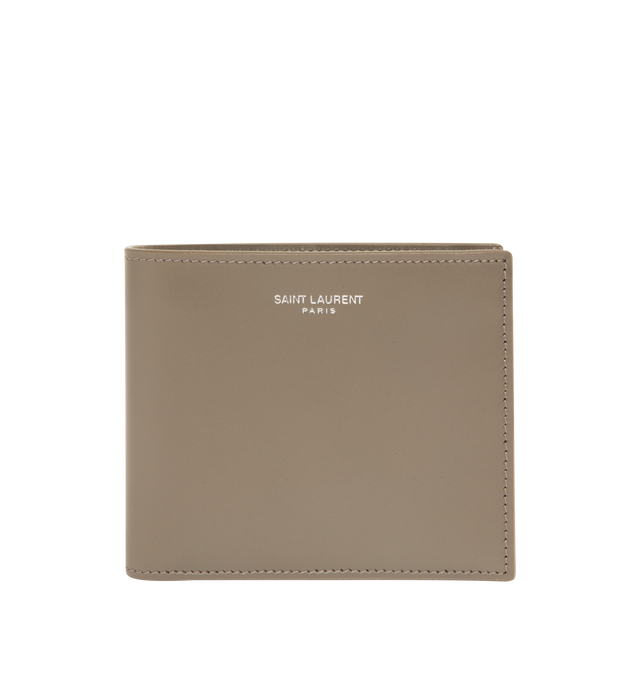 Image 1 of 3 - BROWN - SAINT LAURENT East West Wallet featuring single-fold wallet with embossed signature, leather lining, silver-toned hardware, eight card slots, two bill compartments and two receipt compartments. 4.5" x 3.7" x 0.6". Calfskin leather. Made in Italy.