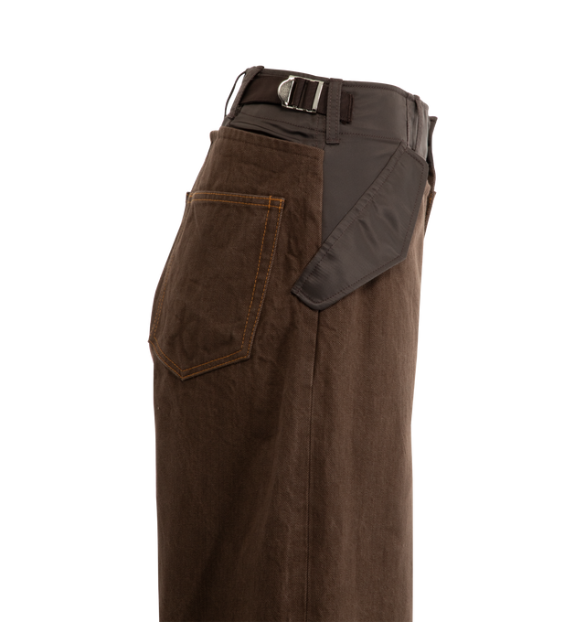 Image 4 of 4 - BROWN - SACAI Denim Pants featuring wide-leg, cotton denim design and a spliced nylon double-waistband, belt loops, side slit pockets with flap, 2 back welt pockets, adjustable waist and zip fly. 100% cotton. 100% nylon. Made in Japan.