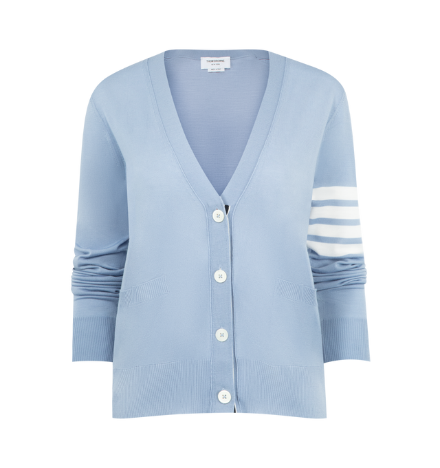 Image 1 of 3 - BLUE - THOM BROWNE 4-Bar Merino Wool Cardigan featuring V-neck, front button closure with striped grosgrain placket, 4-bar stripe detailing, buttoned side vents and cuffs with signature striped grosgrain trim and signature striped grosgrain loop tab at back of neck. 100% merino wool. Made in Italy.