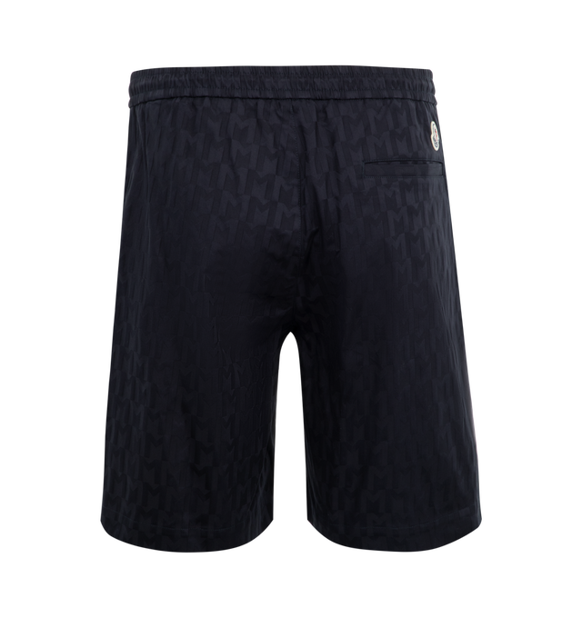 Image 2 of 3 - NAVY - Moncler Monogram Printed Shorts have an elastic drawstring waist, side pockets, and a back button flap pocket. 100% polyester. Made in Italy