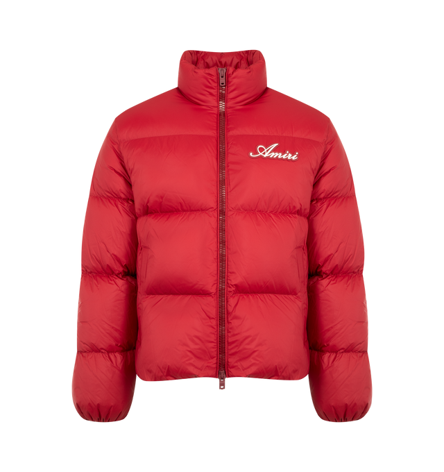 Image 1 of 3 - RED - AMIRI Bones Down Puffer Jacket featuring a logo at the chest, signature bone graphics on each sleeve, stand collar, drop shoulders, long sleeves, elasticized cuffs, waist zip pockets and two-way front zip closure. 100% nylon.