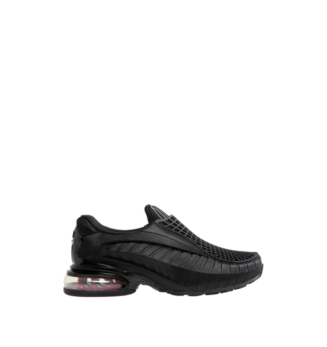 Image 1 of 5 - BLACK - Nike Women's Air Max Dolce Shoes revive an iconic silhouette that seamlessly transitions from casual everyday wear to elevated styling. Originally rooted in performance running, this distinctive design retains the signature details that made it a standout within the Air Max family, including a laceless molded upper, supportive overlay cage, and visible Max Air cushioning in the heel. Finished with a foam midsole for enhanced comfort, the Air Max Dolce delivers lightweight cushioning a