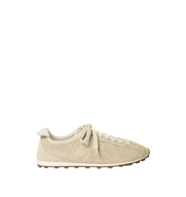 Image 1 of 4 - WHITE - JACQUEMUS Tennis Sneaker featuring soft sneakers in soft crocodile-embossed suede, almond-shaped toe, flat laces, embossed logo on the tongue, embossed logo on the heel tab, removable leather-covered insole and rubber outsole in a round and square shape. 100% calf leather. Outsole: 100% thermoplastic polyurethane. Made in Portugal.