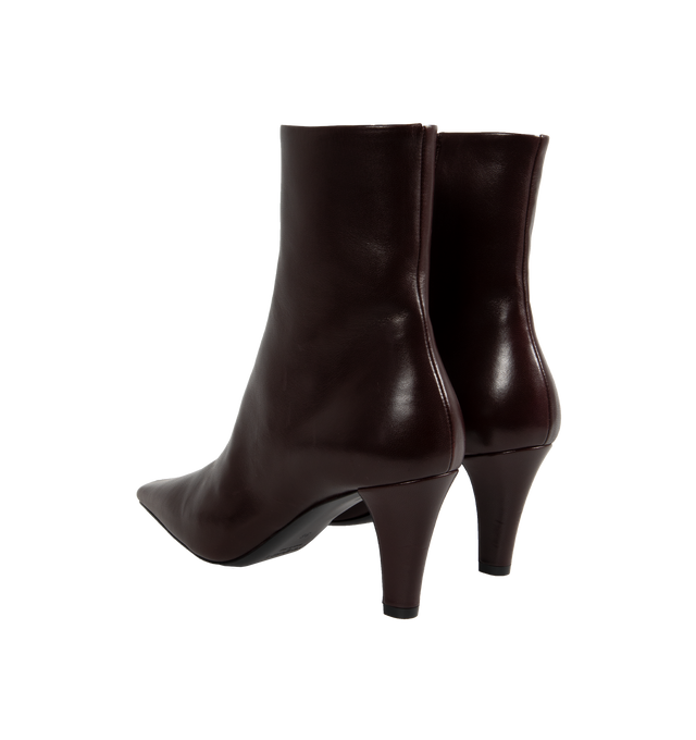 Image 3 of 4 - RED - Saint Laurent Josie Booties have square pointed toes, a tapered block heel with a Cassandre in bronze tone metal on the inside heel, and a side zip closure. 100% lambskin. Made in Italy.