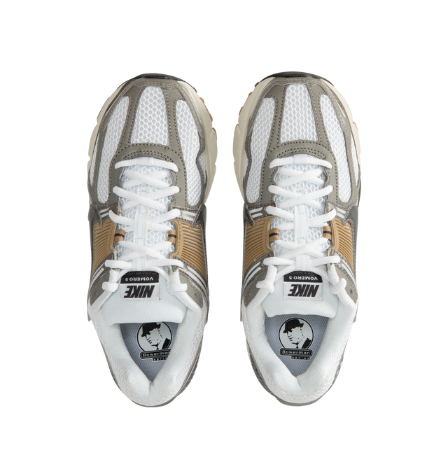 Image 5 of 5 - GREY - NIKE Zoom Vomero 5 Sneaker featuring synthetic leather on the upper, mesh panels and ventilation ports on the heel, Zoom Air cushioning, plastic caging on the side, reflective details and rubber outsole.