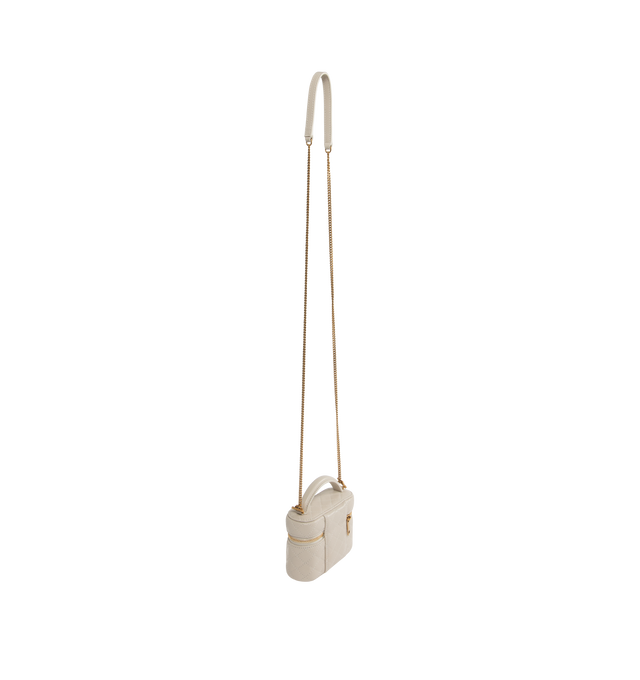 Image 2 of 3 - WHITE - Saint Laurent micro version of the GABY vanity sized to fit small items such as AirPods, keys, lipstick, and cards. Decorated with the CASSANDRE and diamond-quilted overstitching. Crafted from Lambskin and fully lined in leather, featuring a detachable chain strap for multiple carry options, bronze-toned hardware, zip closure, one card slot. Measures 4.7" x 3.1" x 1.6" with 1.8" handle drop and 21.7" strap drop. Made in Italy