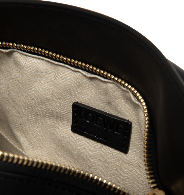 Image 3 of 3 - BLACK - LOEWE Small Puzzle Bag in classic calfskin and suede featuring distinctive geometric lines and cuboid form, intarsio stripes in a colourway-specific pattern, shoulder, crossbody or hand carry, detachable and adjustable strap, zip closure with calfskin pull, one external zip rear pocket, one internal slip pocket, suede lining and embossed Anagram. Classic Calf/Suede. 16.5 cm x 24 cm x 10.5 cm. Made in Spain.