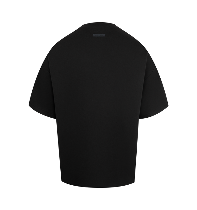 Image 2 of 2 - BLACK - FEAR OF GOD ESSENTIALS Pique 90's Short Sleeve Tee made from medium-weight cotton/poly pique knit featuring a 90s fit with oversized proportions and dropped shoulders. Minimalist branding includes a Fear of God Essentials rubberized label on the center front and the back collar. 100% cotton.