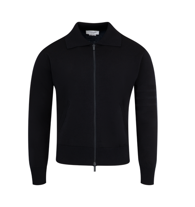 Image 1 of 2 - NAVY - THOM BROWNE Double Face Full Zip Cardigan featuring merino wool fabric, a zippered closure, subtle knit 4-bar stripes, side slip pockets and signature striped grosgrain loop tab. 68% virgin wool, 20% linen, 9% cotton, 3% polyamide. Made in Italy.