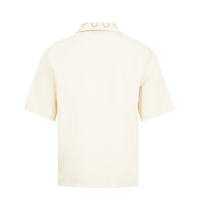 Image 2 of 2 - WHITE - AMIRI Stud Camp Shirt featuring front button closure, dront silver-tone studded logo, rhinestone and silver-tone studded detailing at collar, short sleeves and lightweight sateen fabric. 60% modal, 40% polyester. Made in Italy.